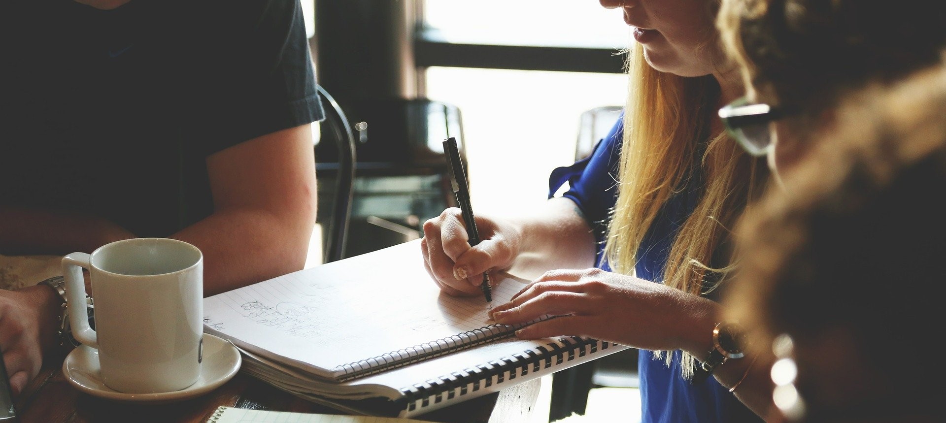 People sitting working at table